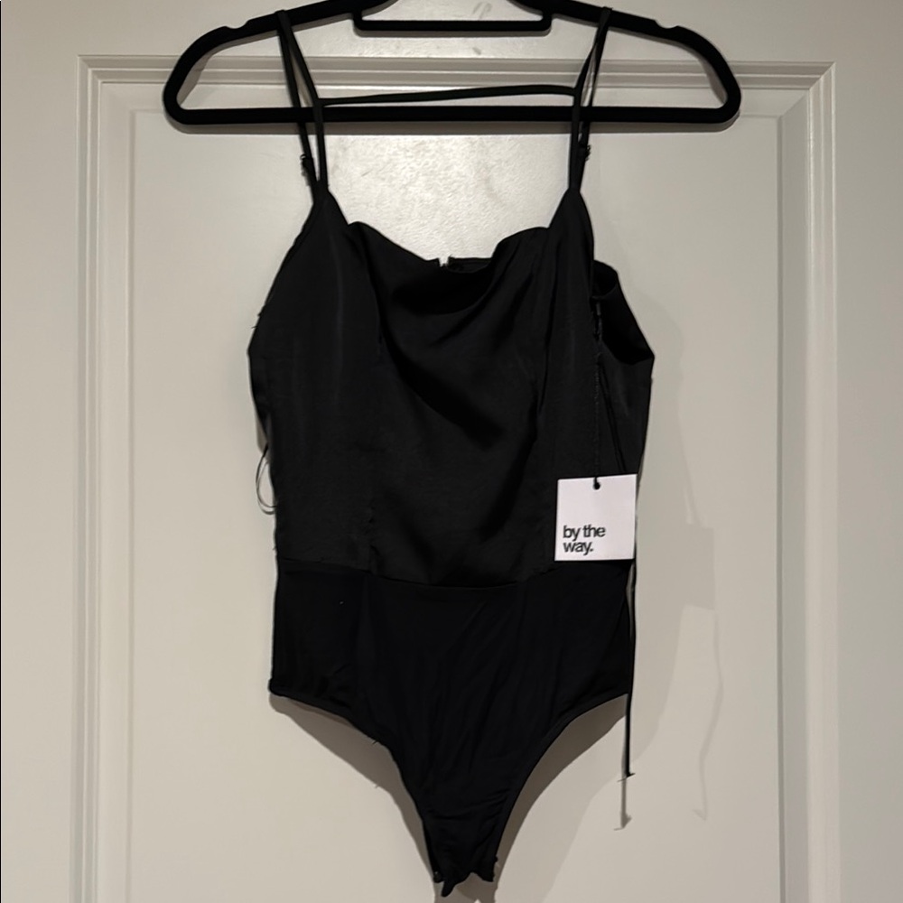 Black Bodysuit by the way.